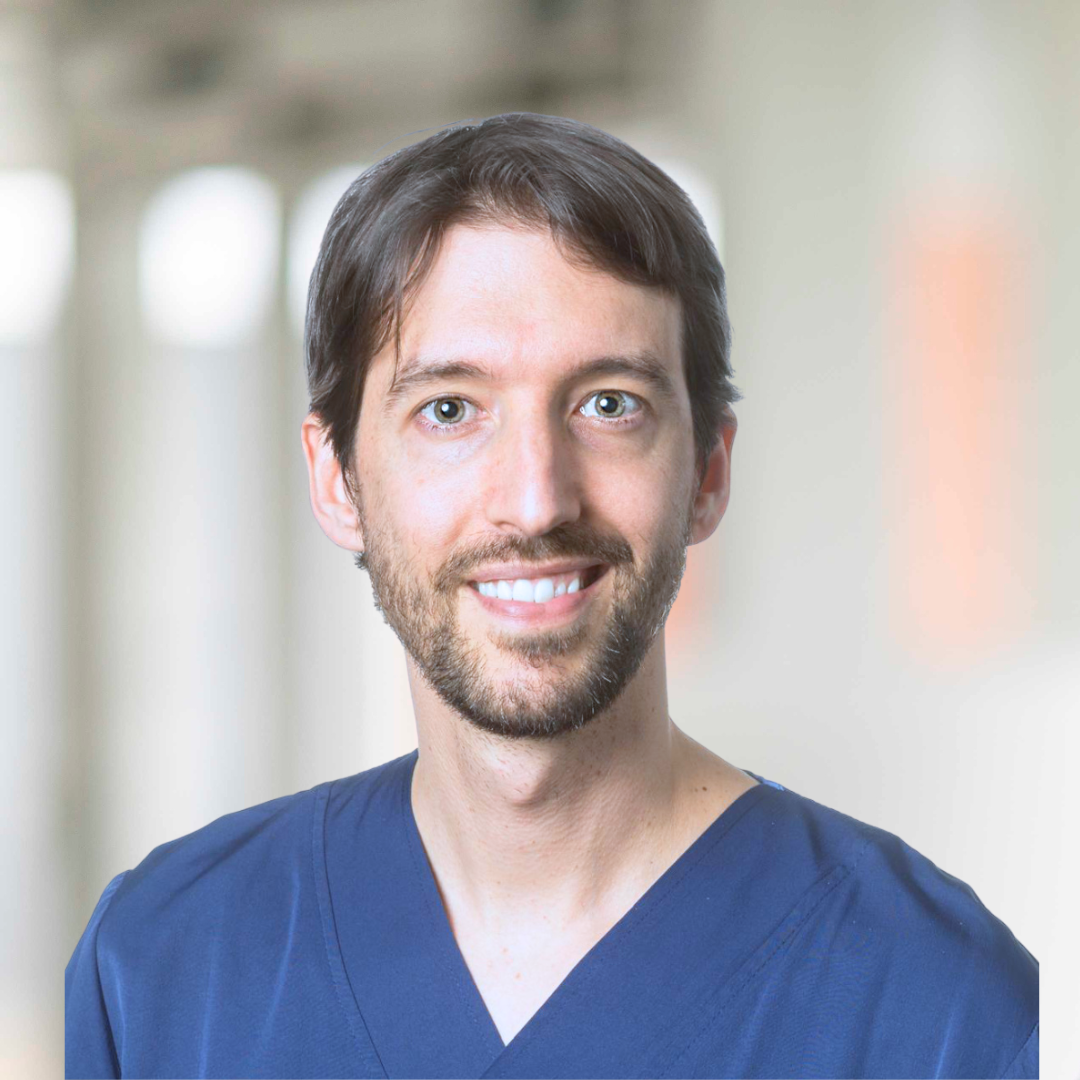 Dr. Van Eeckhout met achtergrond