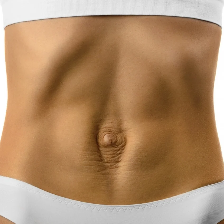 a close up of a woman's belly